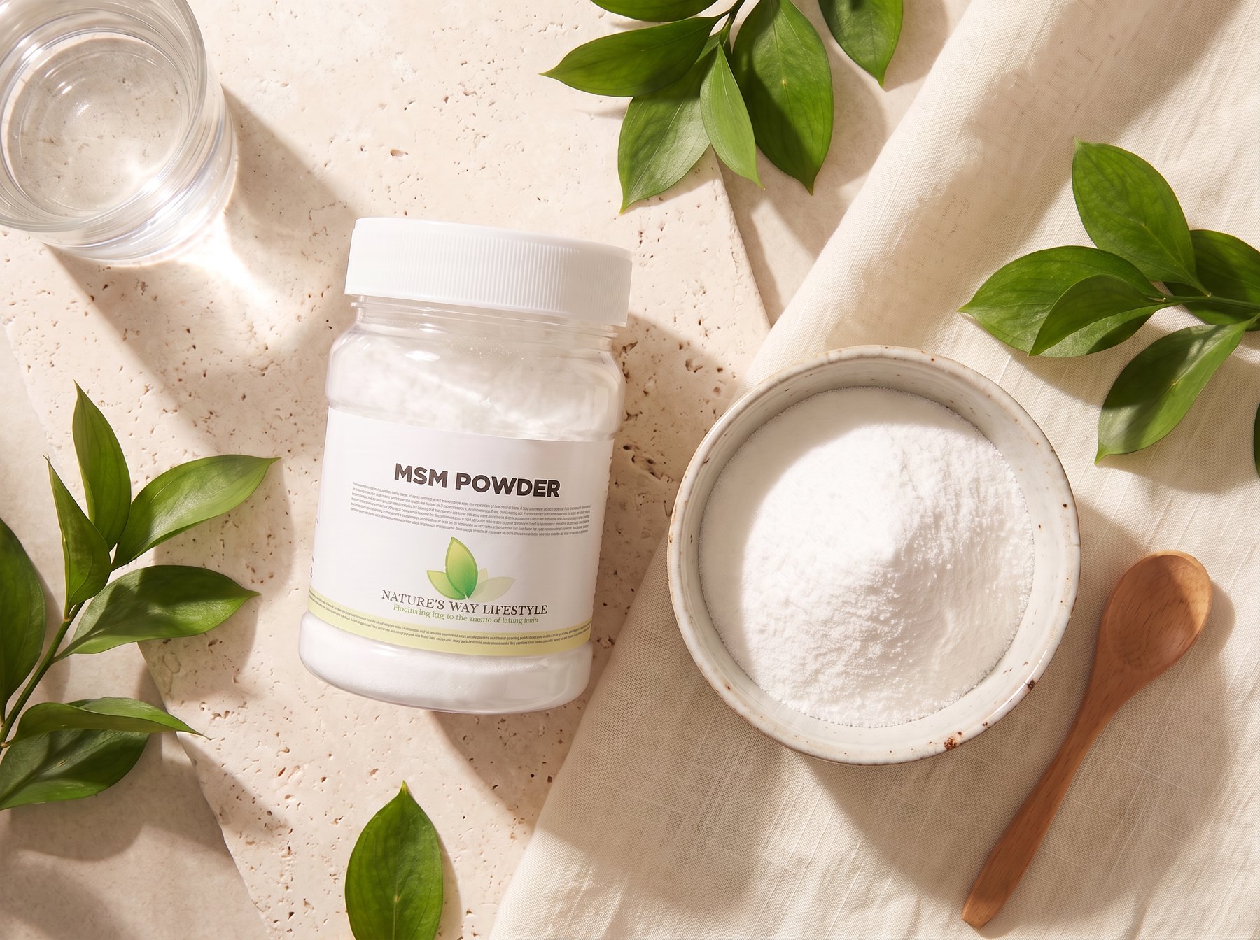 MSM Powder jar beside a bowl of powder, leaves and a glass of water